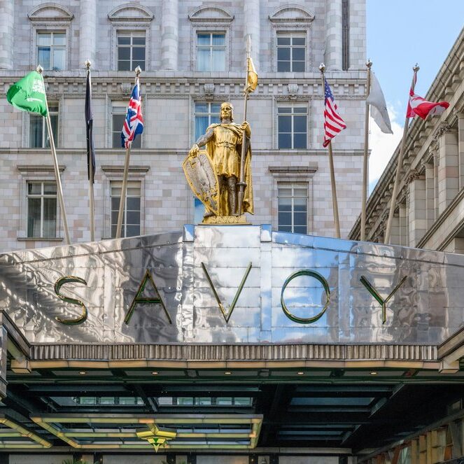 Savoy Hotel, London. Sign above the entrance to the Savoy Hotel, The Strand, London, England, UK Sign above the Savoy Hotel in London